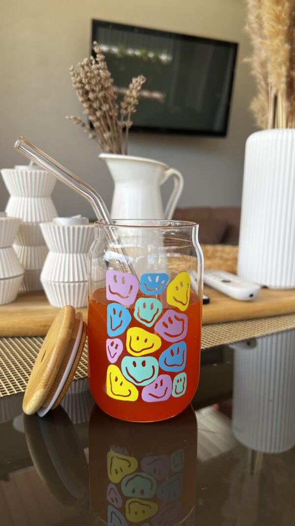 Glass cup with lid and straw