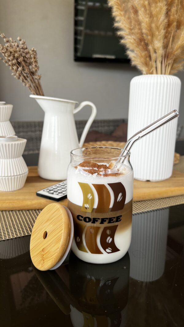 Glass cup with lid and straw