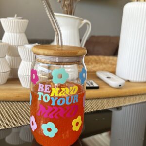 Glass cup with lid and straw